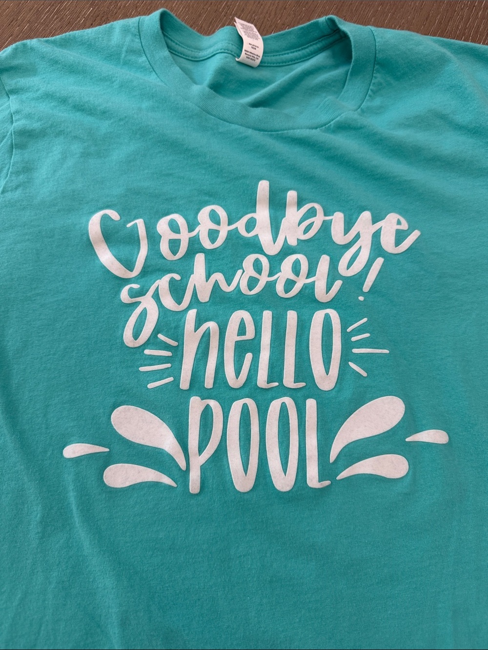 Bella Canvas Teal Short Sleeve Tee with White Pool Graphic